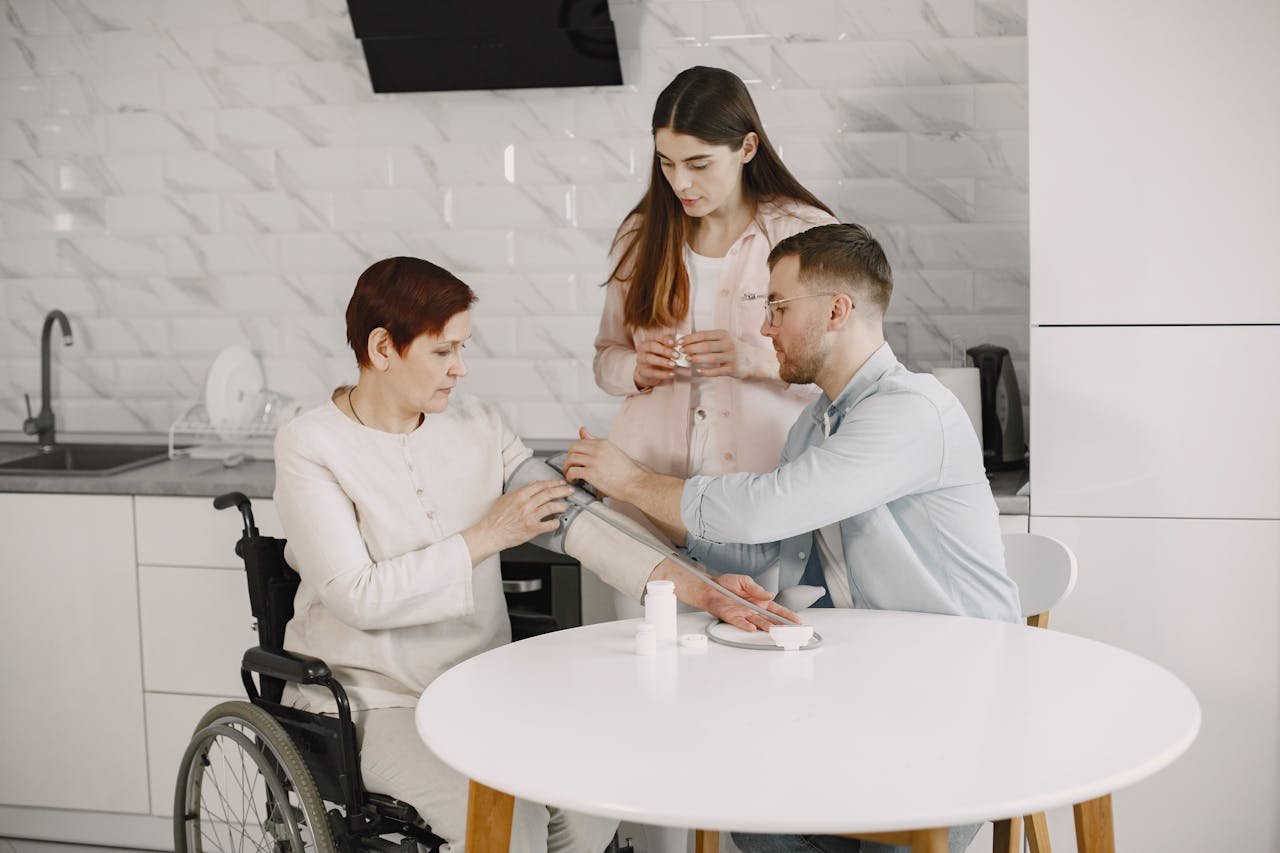 ours-journey A family monitors blood pressure at home, ensuring health and wellness.