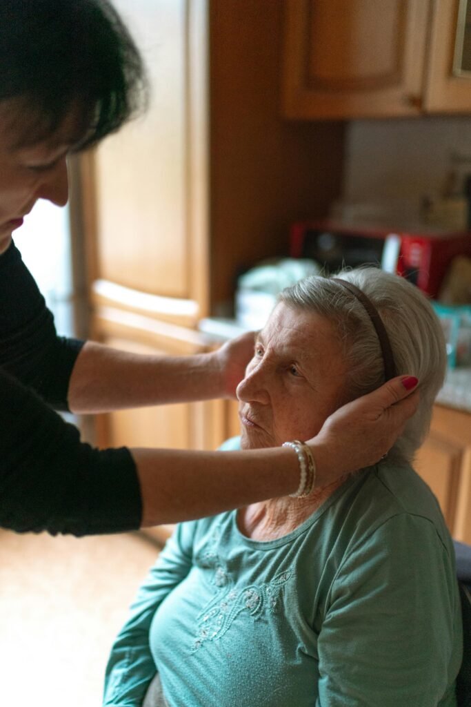 pexels photo 29372693 29372693 A senior woman receiving attentive home care assistance indoors, promoting comfort and support.